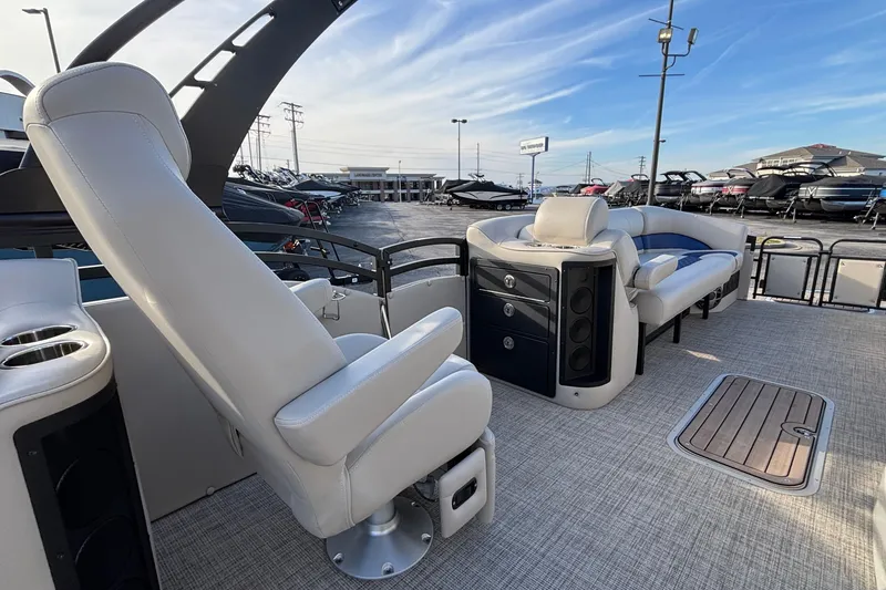 Slide: The Image of 2026 JC Neptoon 25TT Sport pontoon boat interior with luxurious seating and modern design. - 19