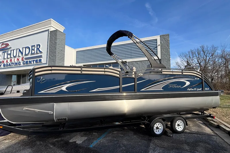 Slide: The Image of 2026 JC Neptoon 25TT Sport pontoon boat on trailer at Thunder Marine Boating Center. - 3