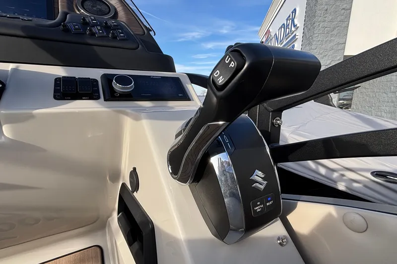 Slide: The Image of Control panel of 2026 JC Neptoon 25TT Sport boat with Suzuki throttle lever. - 36