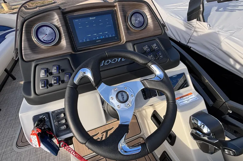 Slide: The Image of Steering console of 2026 JC Neptoon 25TT Sport with modern controls and display. - 37