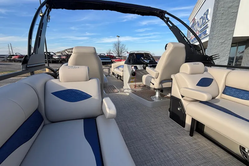 Slide: The Image of 2026 JC Neptoon 25TT Sport pontoon boat interior with luxurious seating and modern helm. - 15