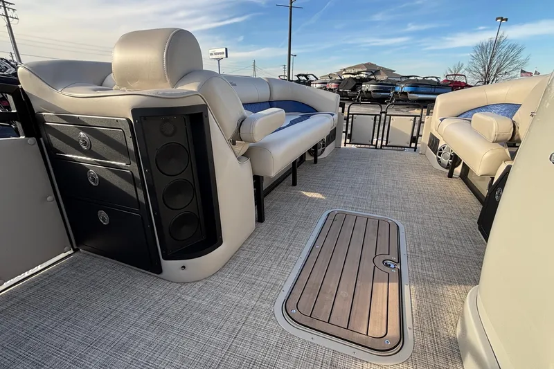 Slide: The Image of 2026 JC Neptoon 25TT Sport pontoon boat interior with luxurious seating and modern design. - 23