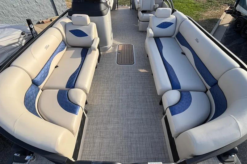 Slide: The Image of Luxurious 2026 JC Neptoon 25TT Sport pontoon boat interior with plush seating. - 26