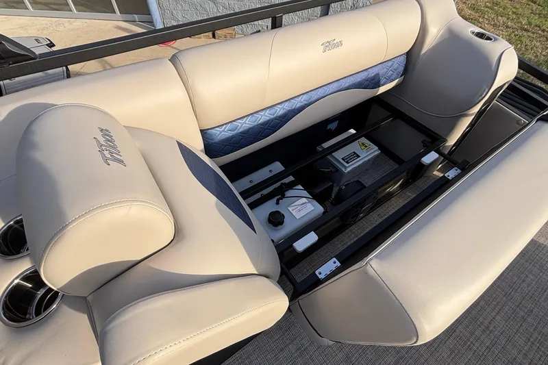Slide: The Image of 2026 JC Neptoon 25TT Sport boat interior with beige seating and storage compartment. - 6