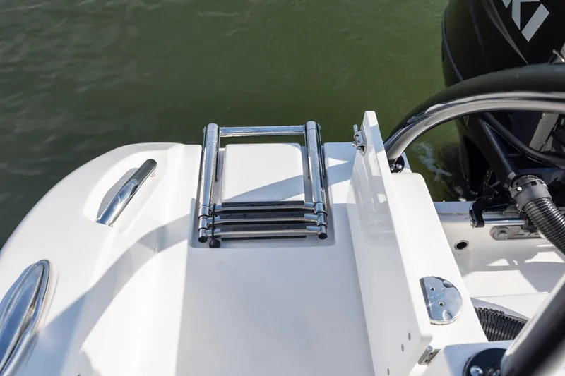 Slide: The Image of 2023 Sea Pro 219 Deep V CC boat with stainless steel swim ladder and motor. - 23