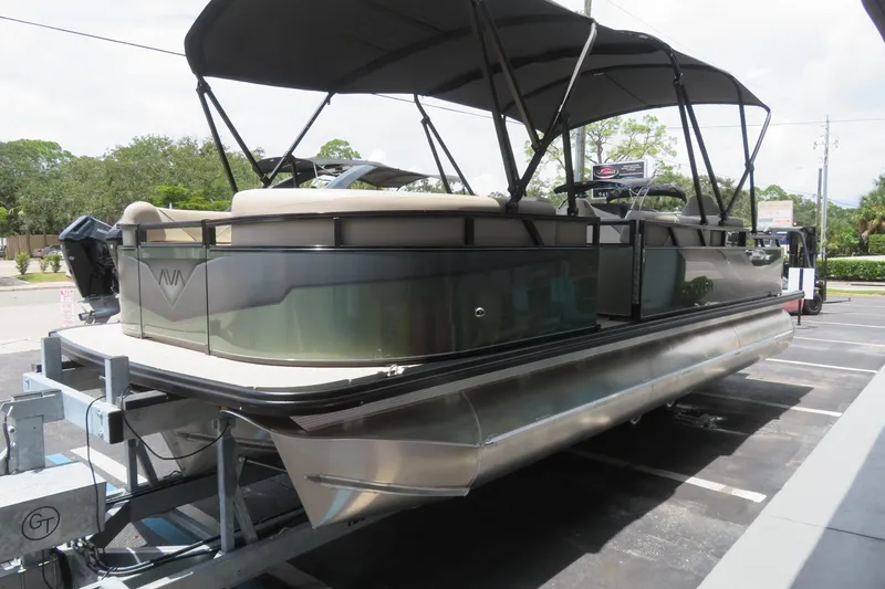 Slide: The Image of 2026 Avalon 2385 Venture 85 Rear Fish luxury tri-toon boat in Sarasota, FL, on trailer. - 5