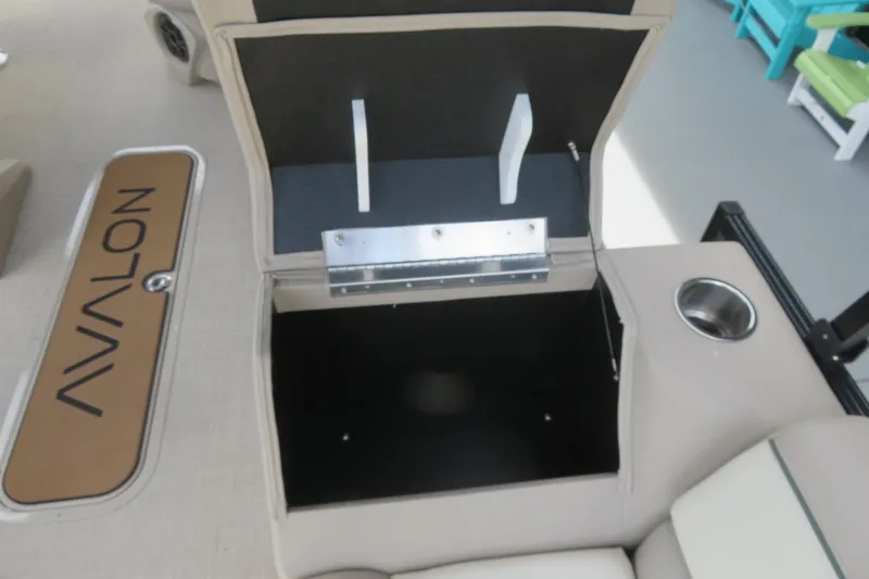 Slide: The Image of Open storage compartment in 2026 Avalon 2385 Venture 85 Rear Fish luxury tri-toon boat. - 50