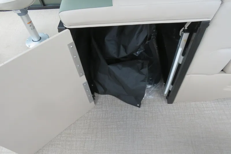 Slide: The Image of Open storage compartment in Avalon 2385 Venture 85 Rear Fish luxury tri-toon boat, 2026 model. - 62