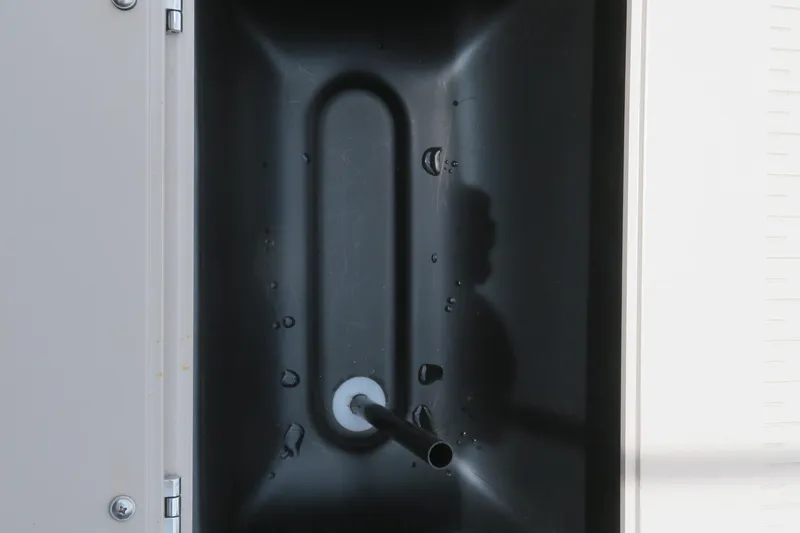 Slide: The Image of Close-up of a black compartment with a pipe, part of Avalon 2385 Venture 85 Tri toon. - 65