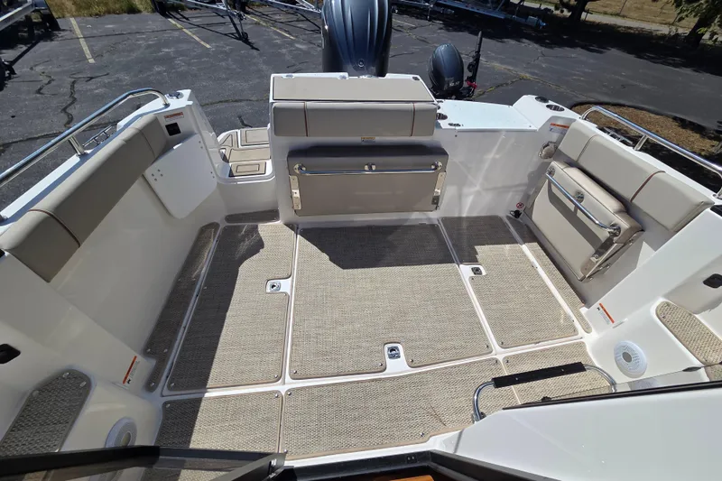 Slide: The Image of 2026 Cutwater C-248 Coupe boat interior with spacious seating and modern design. - 9