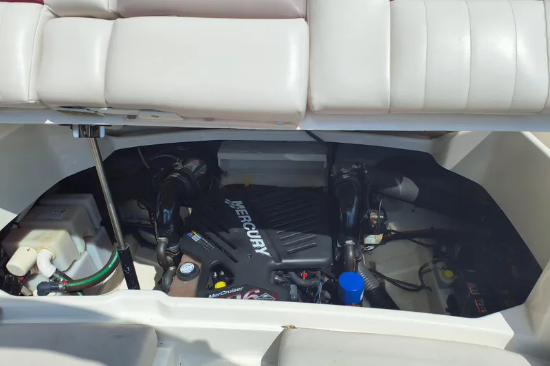 Slide: The Image of Engine compartment of a 2005 Sea Ray 270 SLX boat with Mercury engine. - 12