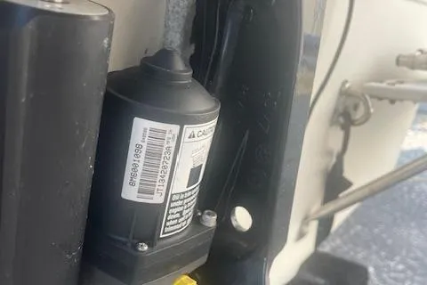 Slide: The Image of Close-up of a 2005 Carolina Skiff Sea Chaser 1800 boat component with label. - 13