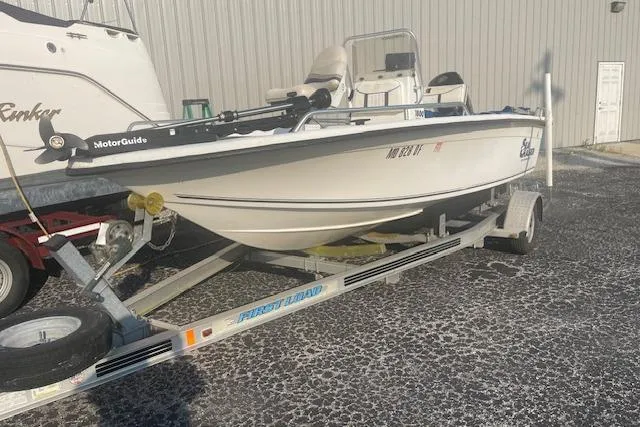 Slide: The Image of 2005 Carolina Skiff Sea Chaser 1800 boat on trailer, parked outdoors. - 5