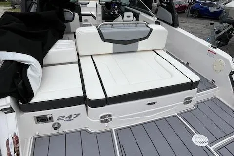 Slide: The Image of 2023 Chaparral 247 SSX boat with sleek white seating and modern deck design. - 3