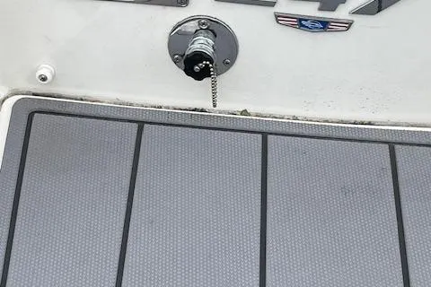 Slide: The Image of 2023 Chaparral 247 SSX boat deck with fuel cap and logo. - 4