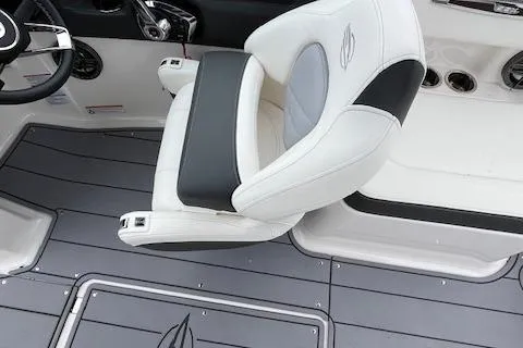 Slide: The Image of 2023 Chaparral 247 SSX boat interior with sleek seating and modern design. - 9