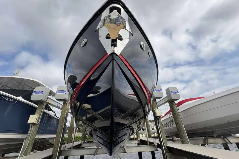 Slide: The Image of 2026 Monterey Elite 30 OB boat docked, showcasing sleek design and modern features. - 15