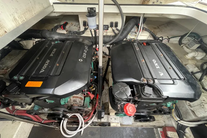 Slide: The Image of Engine compartment of a 2011 Chaparral 330 Signature boat with dual Volvo Penta engines. - 47