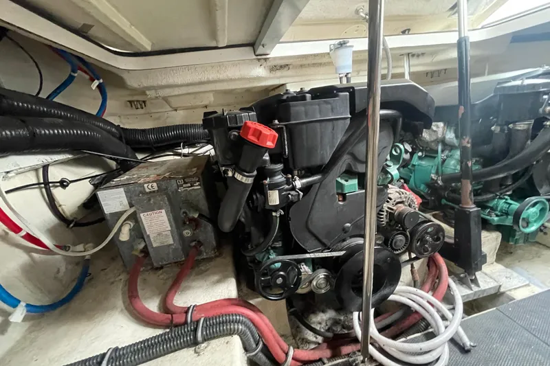 Slide: The Image of Engine room of 2011 Chaparral 330 Signature boat with visible components and wiring. - 51