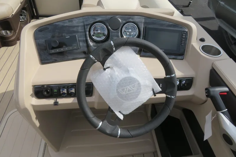 Slide: The Image of Steering console of 2026 Avalon 2385 LSZ Quad Lounger luxury tri-toon in Sarasota, FL. - 30