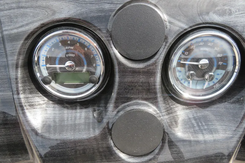 Slide: The Image of Dashboard gauges of 2026 Avalon 2385 LSZ Quad Lounger, showing RPM and speedometer. - 32