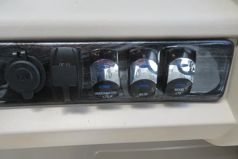 Slide: The Image of Control panel of 2026 Avalon 2385 LSZ Quad Lounger with lighting switches. - 35