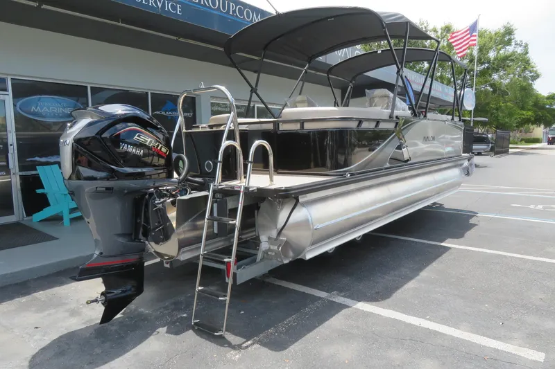 Slide: The Image of 2026 Avalon 2385 LSZ Quad Lounger luxury tri-toon boat in Sarasota, FL, with Yamaha engine. - 3