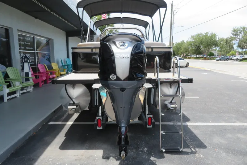 Slide: The Image of 2026 Avalon 2385 LSZ Quad Lounger luxury tri-toon boat, rear view, Sarasota, FL. - 4