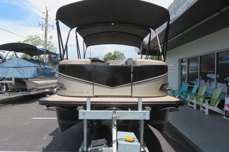 Slide: The Image of 2026 Avalon 2385 LSZ Quad Lounger luxury tri-toon boat in Sarasota, FL dealership. - 6