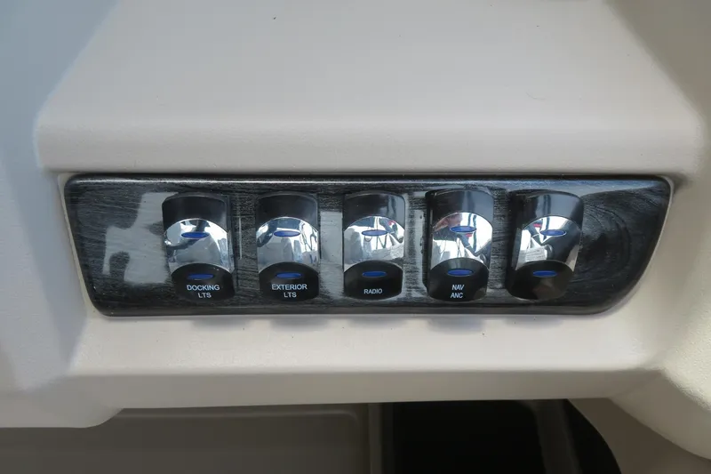 Slide: The Image of Control panel of 2026 Avalon 2385 LSZ Quad Lounger with labeled switches. - 36