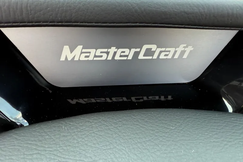 Slide: The Image of 2025 MasterCraft NXT24 logo on a sleek, modern dashboard. - 22