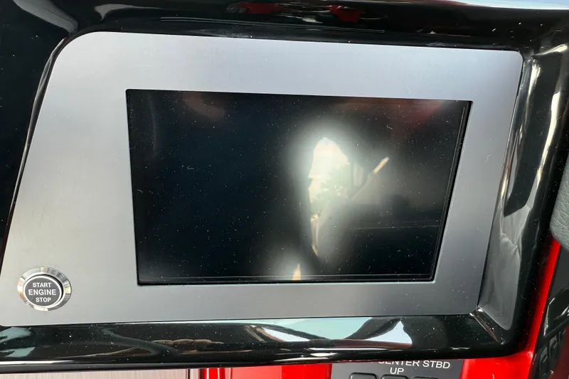 Slide: The Image of Dashboard display of a 2025 MasterCraft NXT24 boat with start engine button. - 24