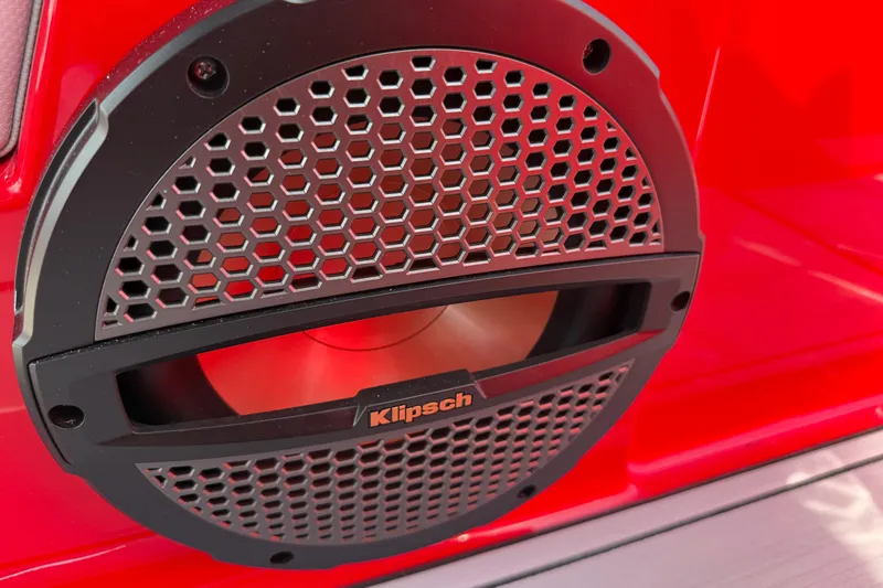 Slide: The Image of Close-up of Klipsch speaker on 2025 MasterCraft NXT24 boat, red background. - 29