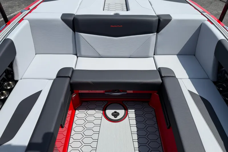 Slide: The Image of 2025 MasterCraft NXT24 boat interior with sleek seating and modern design. - 31