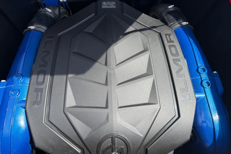 Slide: The Image of 2025 MasterCraft NXT24 engine with Ilmor branding, featuring a sleek black and blue design. - 34