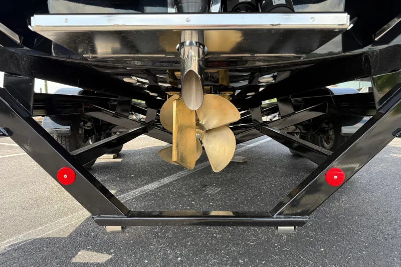 Slide: The Image of 2025 MasterCraft NXT24 boat propeller and trailer detail, showcasing engineering and design. - 6