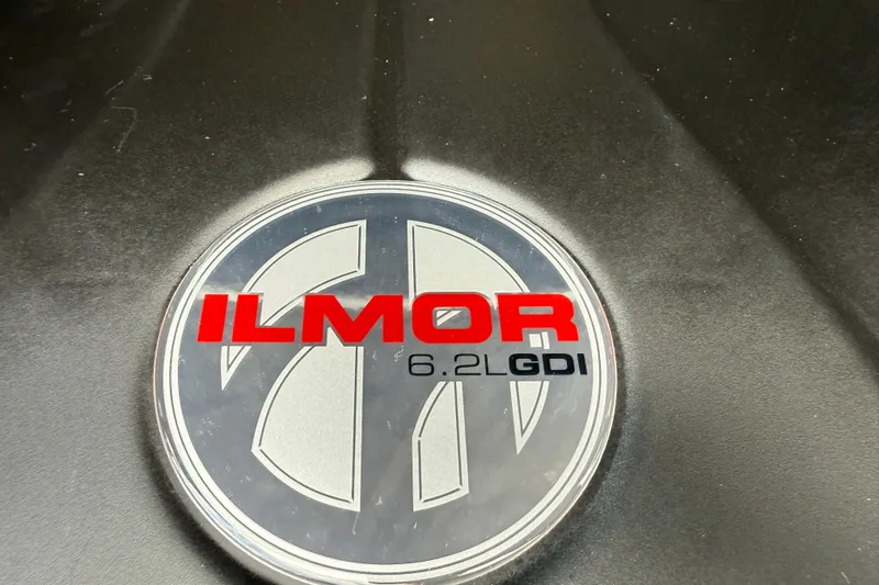 Slide: The Image of Ilmor 6.2L GDI engine emblem on 2025 MasterCraft X24 boat. - 27