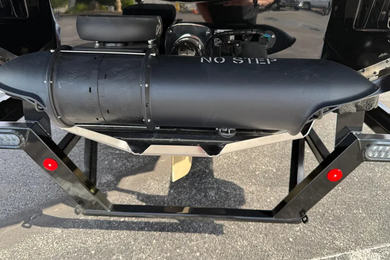 Slide: The Image of 2025 MasterCraft X24 boat propeller with "No Step" warning label. - 31