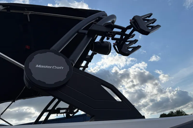 Slide: The Image of 2025 MasterCraft X24 boat tower against a cloudy sky backdrop. - 35