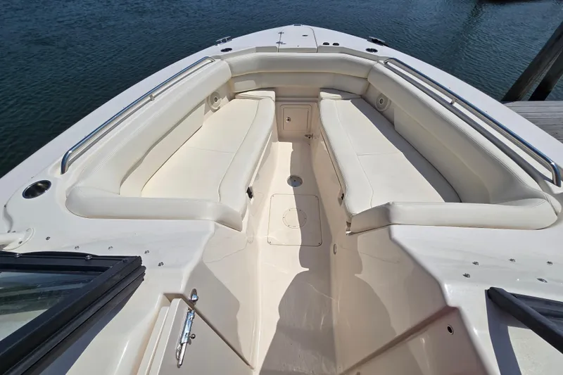 Slide: The Image of 2016 Grady-White Freedom 307 boat interior with spacious seating and sleek design. - 18