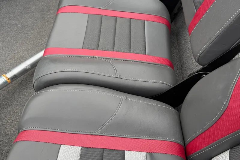Slide: The Image of 2021 Ranger RT178 boat seats with gray and red upholstery. - 14