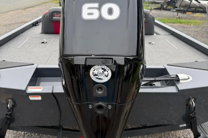 Slide: The Image of 2021 Ranger RT178 boat with a 60 HP outboard motor, rear view. - 2