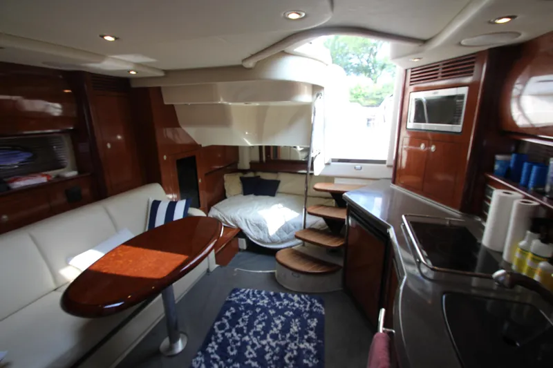 Slide: The Image of Luxurious interior of 2004 Sea Ray 40 Sundancer yacht with modern amenities and cozy seating. - 41