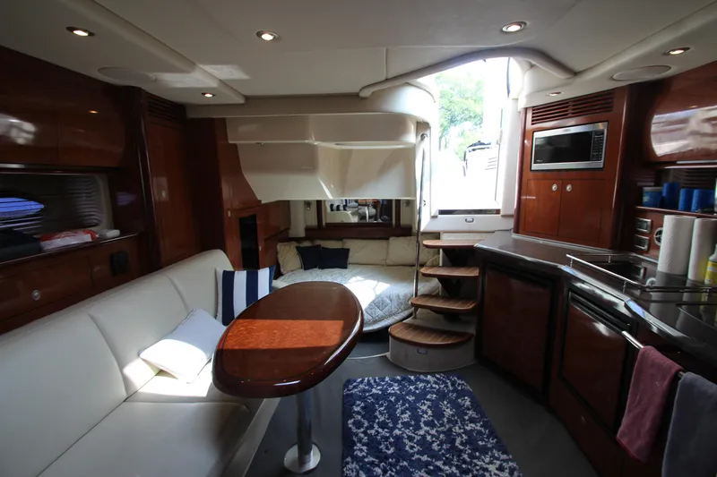 Slide: The Image of Luxurious interior of 2004 Sea Ray 40 Sundancer yacht with modern amenities and elegant design. - 46