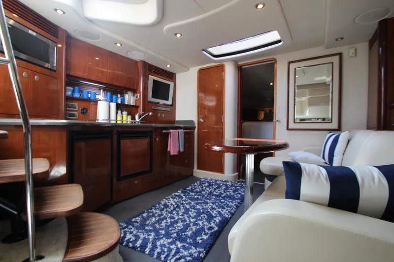 Slide: The Image of Luxurious interior of 2004 Sea Ray 40 Sundancer yacht with modern amenities and elegant design. - 51