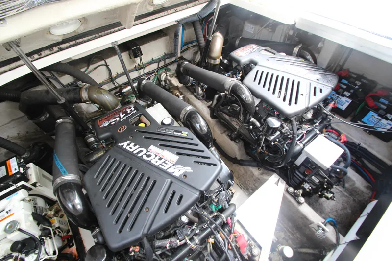 Slide: The Image of Engine room of a 2004 Sea Ray 40 Sundancer with twin MerCruiser engines. - 56