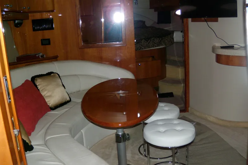 Slide: The Image of Luxurious interior of 2006 Regal Commodore 4460 yacht with plush seating and modern amenities. - 49