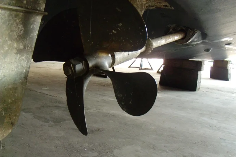 Slide: The Image of Propeller of 2006 Regal Commodore 4460 boat on dry dock. - 58