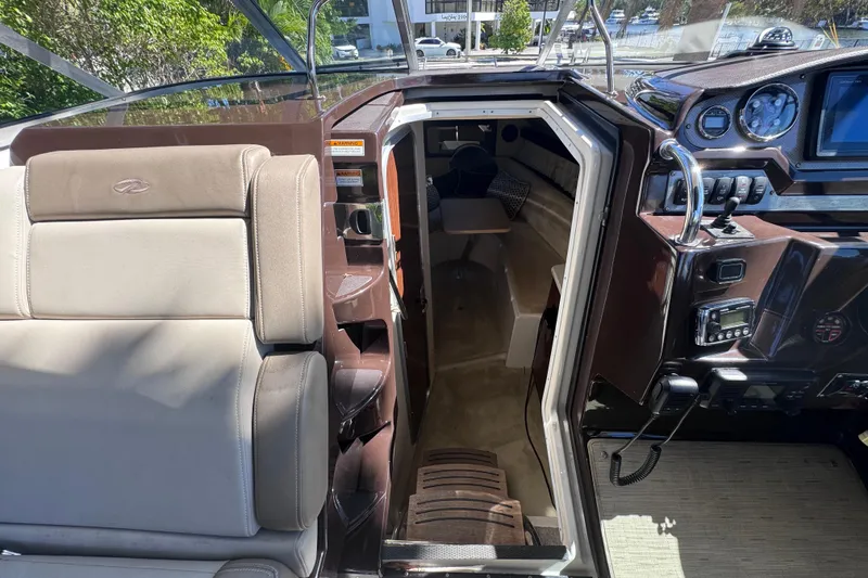 Slide: The Image of 2015 Regal 28 Express boat interior with cockpit and cabin view. - 44