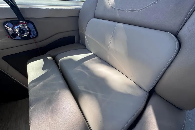 Slide: The Image of 2015 Regal 28 Express interior seating with speaker detail. - 49